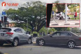 Three-car accident at Bedok junction leaves one car on grass patch
