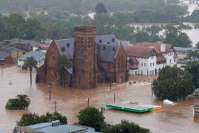 An aerial view of a flooded church and other buildings in the northern New South Wales city of Lismore from an Australian Army helicopter taking part in Operation Flood Assist 2022. 