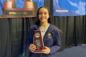 Amita Berthier won a silver medal in the women&#039;s foil at the National Collegiate Athletic Association fencing championships.
