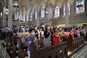 Congregation celebrating Easter Sunday at the Church of Saint Alphonsus on April 17, 2022. 
