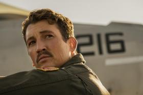 Miles Teller as fighter pilot Lieutenant Bradley "Rooster" Bradshaw in Top Gun: Maverick.