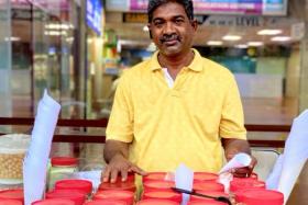 Mr Amirthaalangaram Moorthy, probably Singapore's last kacang puteh seller,  says his business is slowly picking up again.