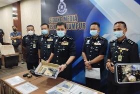 Suspect killed in shootout as KL cops round up robbery gang
