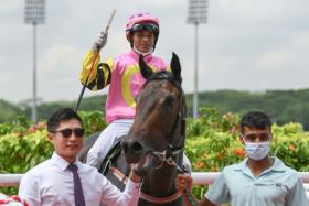 Trainer Jason Ong leading in his smart debut winner Major King, who is aimed at bigger things.