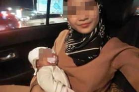 Pastry chef Hajar Nursyahirin Rosman, 26, and two-month-old Hans Mohd Thakif were found lying in a pool of blood.