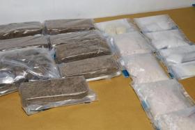 Some of the controlled drugs seized seized in a CNB operation, on July 28, 2022. 