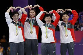 Team Singapore paddlers (from left) Feng Tianwei, Wong Xin Ru, Zeng Jian and Zhou Jingyi posing with their Commonwealth Games gold medals, on Aug 1, 2022. ST PHOTO: GAVIN FOO