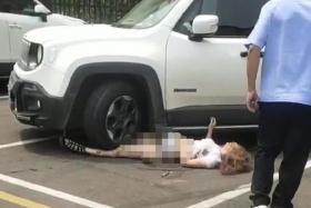 SUV driver knocks down girlfriend, runs her over, again and again