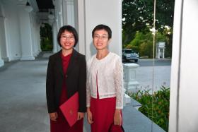 President Scholarship recipient Elizabeth Ng with her mum Ruth Sze at the Istana.
