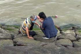 Couple who helped elderly man out of the water at Changi beach touched to find out why he was there