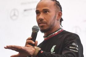 Mercedes' British driver Lewis Hamilton speaks during a press conference in Kuala Lumpur on Sept 28, 2022.
