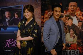 Hong Huifang (left) and her husband, Zheng Geping, are pictured with promotional posters of each of their upcoming movies, Ajoomma and Deleted. 