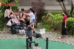 Maids 'park' elderly on wheelchairs; engage in their own activities