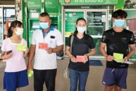 When she returned to her hometown, the man's partner said she wished to divide the remaining 3.1 million baht into three  — one million for her youngest daughter, 500,000 for her middle son, and 1.6 million for Manit. 
