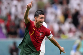 Cristiano Ronaldo celebrating after scoring his team&#039;s first goal during the Qatar 2022 World Cup Group H football match between Portugal and Uruguay at the Lusail Stadium on Monday. 
