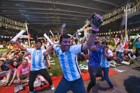 Argentina supporters celebrating at the OCBC Square at the Singapore Sports Hub after Angel di Maria scores the second goal against France.