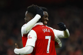 Arsenal&#039;s Eddie Nketiah celebrates scoring the winning goal for his team, with teammate Bukayo Saka. 

