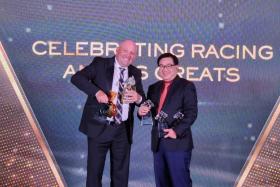 Trainer Daniel Meagher and Lim’s Stable’s owner Lim Siah Mong posing with the six trophies collected at the Singapore Racing Awards gala dinner on Tuesday night. They included three from Lim’s Kosciuszko, who was voted Horse of the Year, Champion Sprinter and Champion Four-Year-Old. ST PHOTO: TAN THEAN LOON