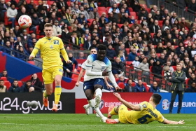 England&#039;s midfielder Bukayo Saka scores his team&#039;s second goal in London, on March 26, 2023. PHOTO: AFP
