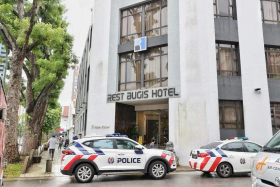 Witnesses said they saw multiple police officers and forensics personnel at the Rest Bugis Hotel at around noon.