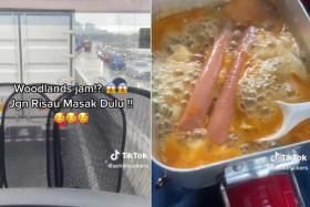 Man cooks lunch in truck while stuck in Causeway jam