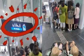 Commuters pay no mind to Russian man with 2 kids in stroller before boarding MRT lift