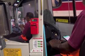 Bus captain eats, looks at phone while driving, SMRT suspends him