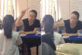 Owner of tuition centre strikes girl with pen in video, says she had parents' approval