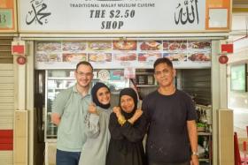 Mdm Hani Isnin-Racine, 40, and her husband (left) help her parents (right) to run The $2.50 Shop at Block 1 Jalan Kukoh, #01-16 daily from 3.30am to 2.30pm.