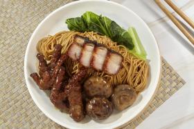 Koon Kee Wanton Mee’s signature is a duo combo of char siew, “flower” mushrooms and braised chicken feet.