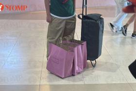The woman spotted a man with multiple bags and told Stomp that he had wiped out the merchandise at the Plaza Singapura outlet.