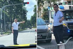 Mayor Alex Yam directs traffic after accident at Choa Chu Kang junction