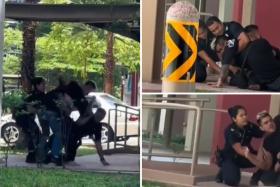 The video shared by Tiagong on Tuesday morning (Aug 8) shows three people trying to subdue a man with dyed hair.