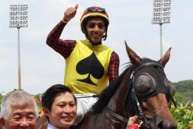 A smiling trainer Jason Ong leading in Top Field (Bruno Queiroz), the second leg of his treble on Sunday. He also saddled Sirius (Queiroz) and Roda Robot (Manoel Nunes) to take his 2023 tally to 36 winners. 