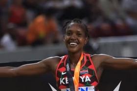 Kenya&#039;s Faith Kipyegon celebrates after winning the Women&#039;s 1500m final at the World Athletics Championships in Budapest on Aug 22, 2023. 