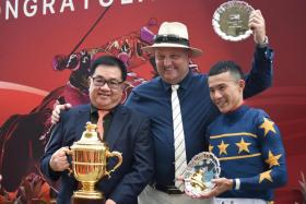 Jockey Wong Chin Chuen celebrating with owner Lim Siah Mong and trainer Daniel Meagher after Lim&#039;s Kosciuszko won the Group 1 Lion City Cup at Kranji on Aug 27. ST PHOTO: SYAMIL SAPARI 