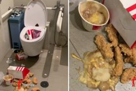 Finger-lickin' bad: Someone leaves mess of KFC food in handicap restroom