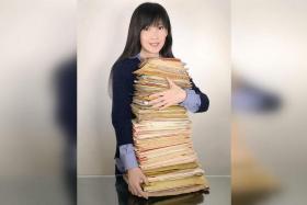 Vivian Chow posted a photo of herself carrying a huge pile of letters on social media in May.