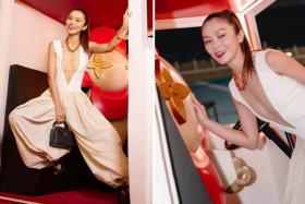 Is that a plunging V-neck top that Joanne Peh is wearing?