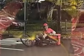 Driver fails to help cyclist knocked over at junction
