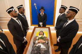 Namewee at his &quot;funeral&quot;.