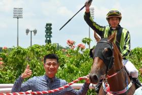 Trainer Richard Lim leading in Blackbuck (apprentice jockey Faiz Khair astride) after his speedster&#039;s all-the-way success in the $75,000 Restricted Maiden race over the Polytrack 1,100m on April 6.
