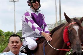 Trainer Kuah Cheng Tee and Brazilian jockey Bernardo Pinheiro taking in the first leg of their double with Last Samurai in the Class 4 race over 1,200m on April 13. They later combined for a second win with War Warrior.
