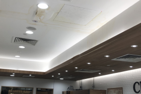 Yellow water stains could be seen on the ceiling of the shop.