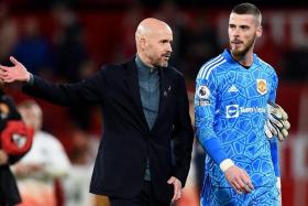Manchester United manager Erik ten Hag with David de Gea after the match.