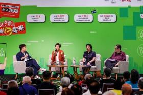 Minister for Communications and Information Josephine Teo (second from left) at a panel discussion on scams on Sept 21.
