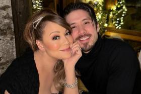 Singer Mariah Carey (left), pictured here in an Instagram post dated Dec 27, 2022, has broken up with Bryan Tanaka (right), her dancer-choreographer boyfriend of seven years.