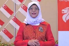 President Halimah Yacob noted that most Covid-19 restrictions have eased, but cautioned that Singapore is not out of the woods yet. 