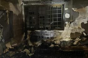 Firefighters extinguished the blaze, which involved the contents of a bedroom, using a water jet.