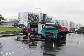 A Malaysian truck can be seen in a video transferring diesel to two containers housed in a lorry.